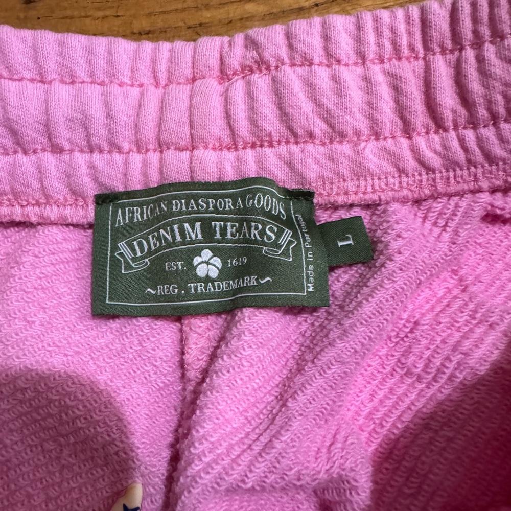 Pink Sweatpants With White Cloud Patterns - image 3